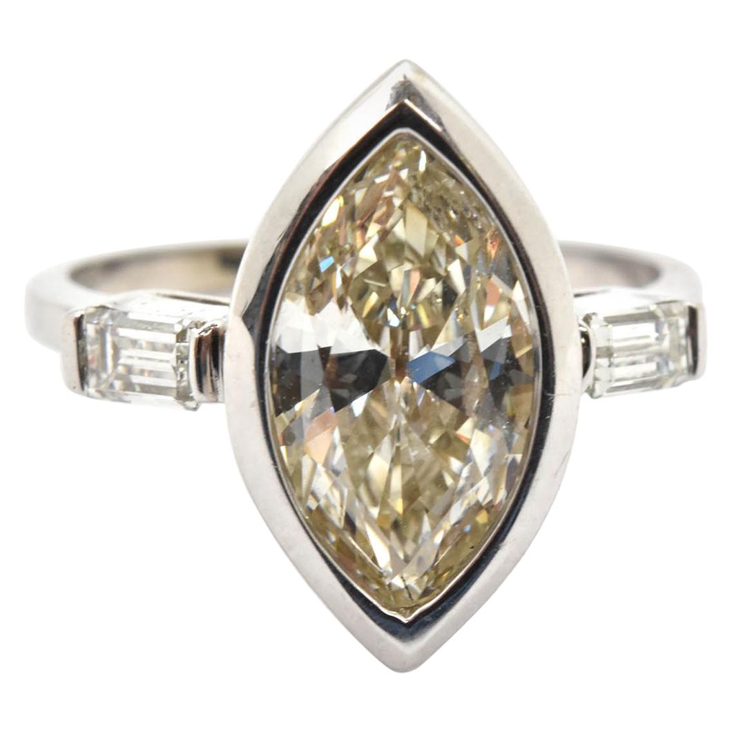14 Karat White Gold and 1.90 Carat Marquise Diamond Ring with Accents