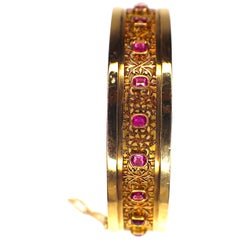 GEMOLITHOS Antique Pink Sapphire Gold Bangle, 1900s