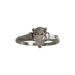 Platinum Engagement Ring Prong Set with Pear Shape Diamond and Baguettes