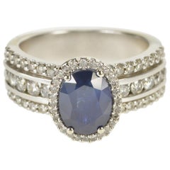 Oval Sapphire Diamond Halo Engagement Ring