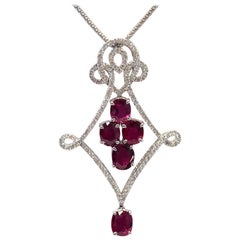 Ruby Oval and White Diamond Round Pendant Necklace in 18 Karat White Gold