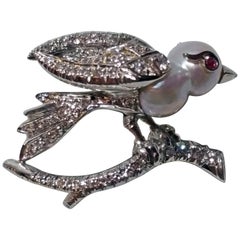 Brooch Bird on Bough Gold Diamonds 0.75 Carat Pearl Ruby, Austria, circa 1935