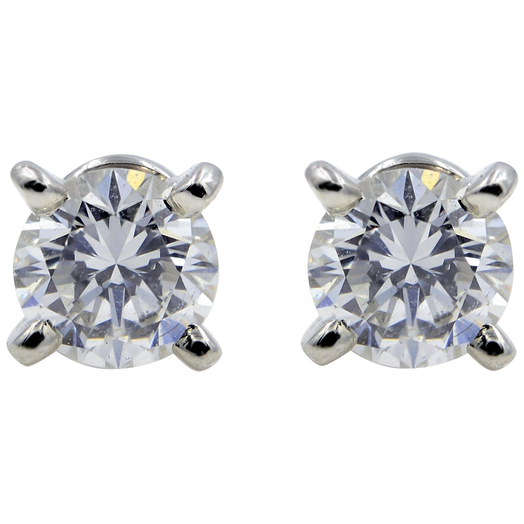 Cartier Diamond Round Cut Stud Earrings GIA 0.49 Carat Platinum