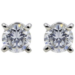 Cartier Diamond Round Cut Stud Earrings GIA 0.49 Carat Platinum