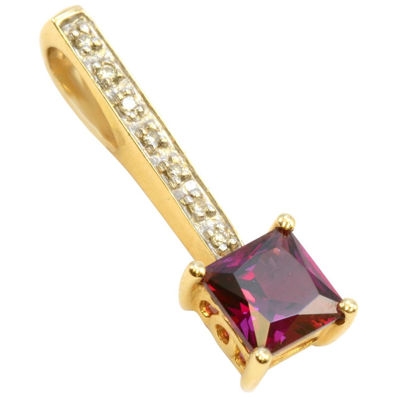 14 Karat Yellow Gold Garnet and Diamond Pendant