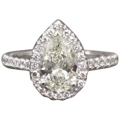 1.00 Carat Pear Shape Diamond with Diamond Halo