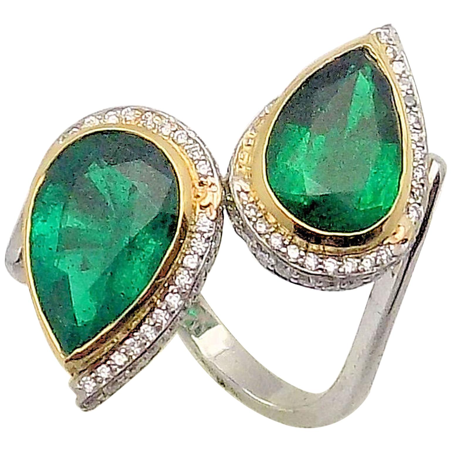 Pear Shaped Emeralds and Diamond Bypass Ring in Platinum and 18 Karat Gold For Sale