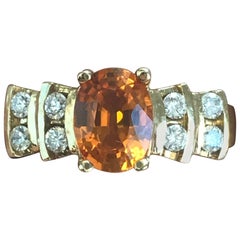 1.9 Carat TW Approximate Oval Orange Sapphire and Diamond Ring, Ben Dannie