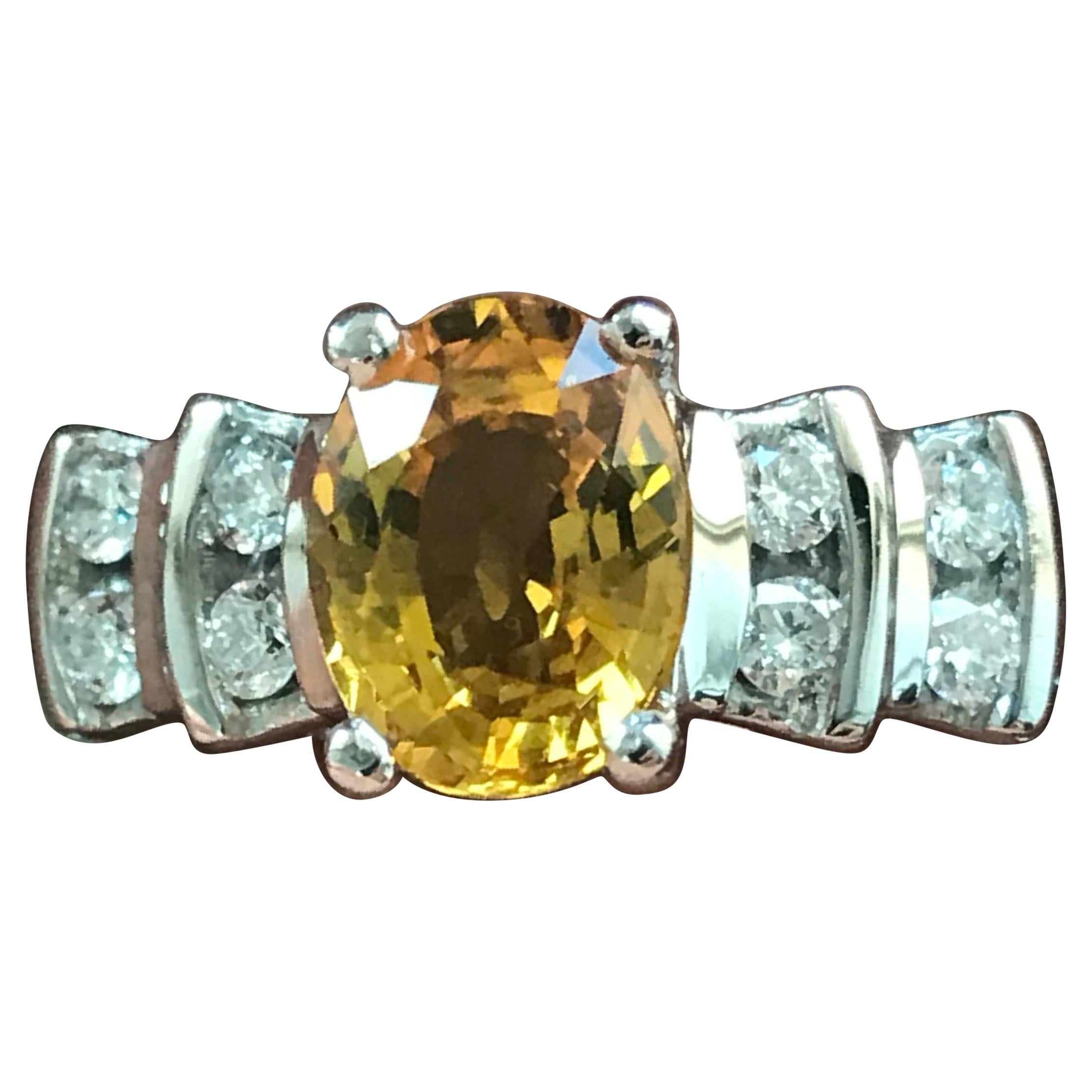 1.9 Carat TW Approximate Oval Orange Sapphire and Diamond Ring, Ben Dannie