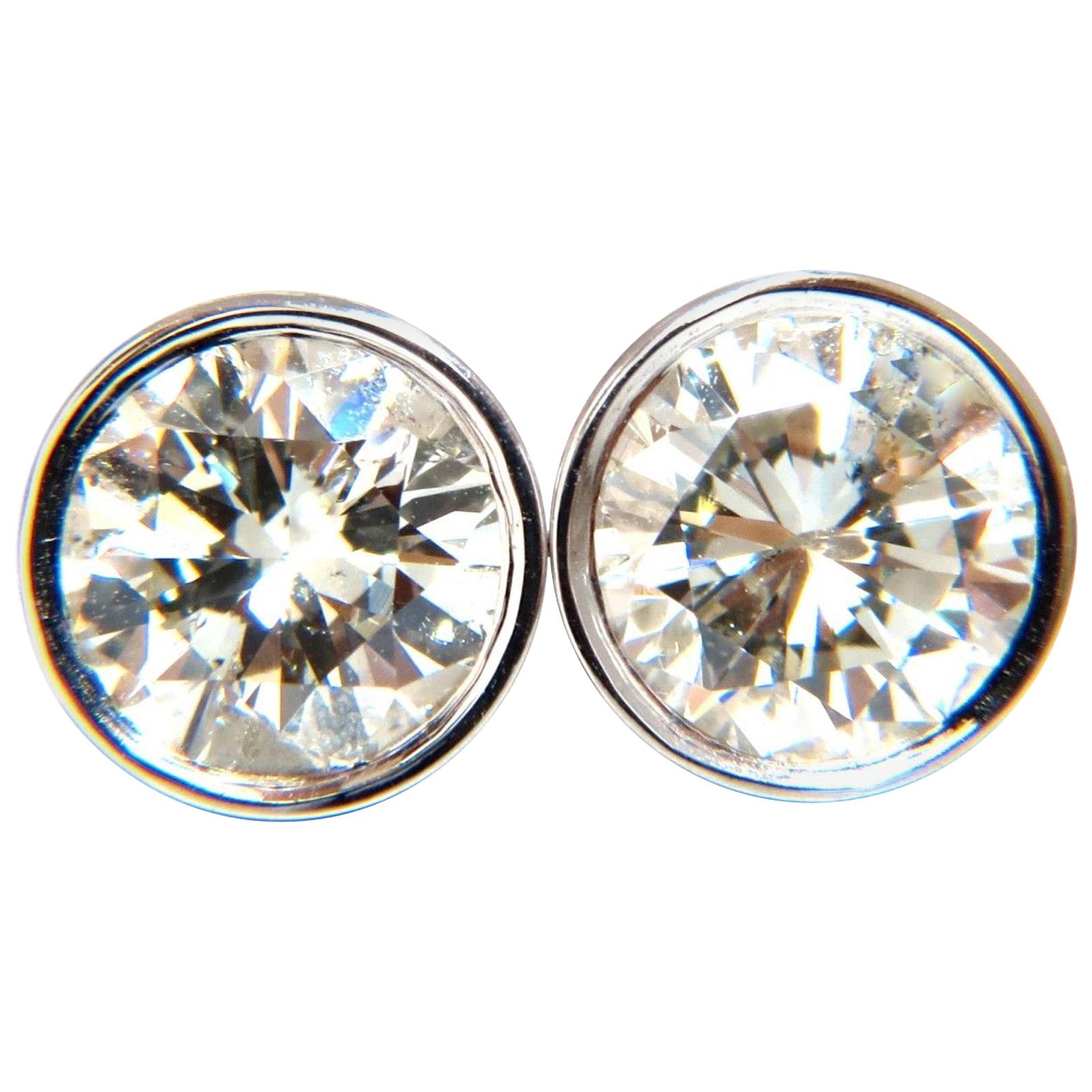 2.06 Carat Natural Round Diamond Stud Earrings 14 Karat Flush For Sale