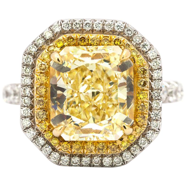 GIA Certified 5.26 Carat Fancy Yellow Diamond Ring For Sale
