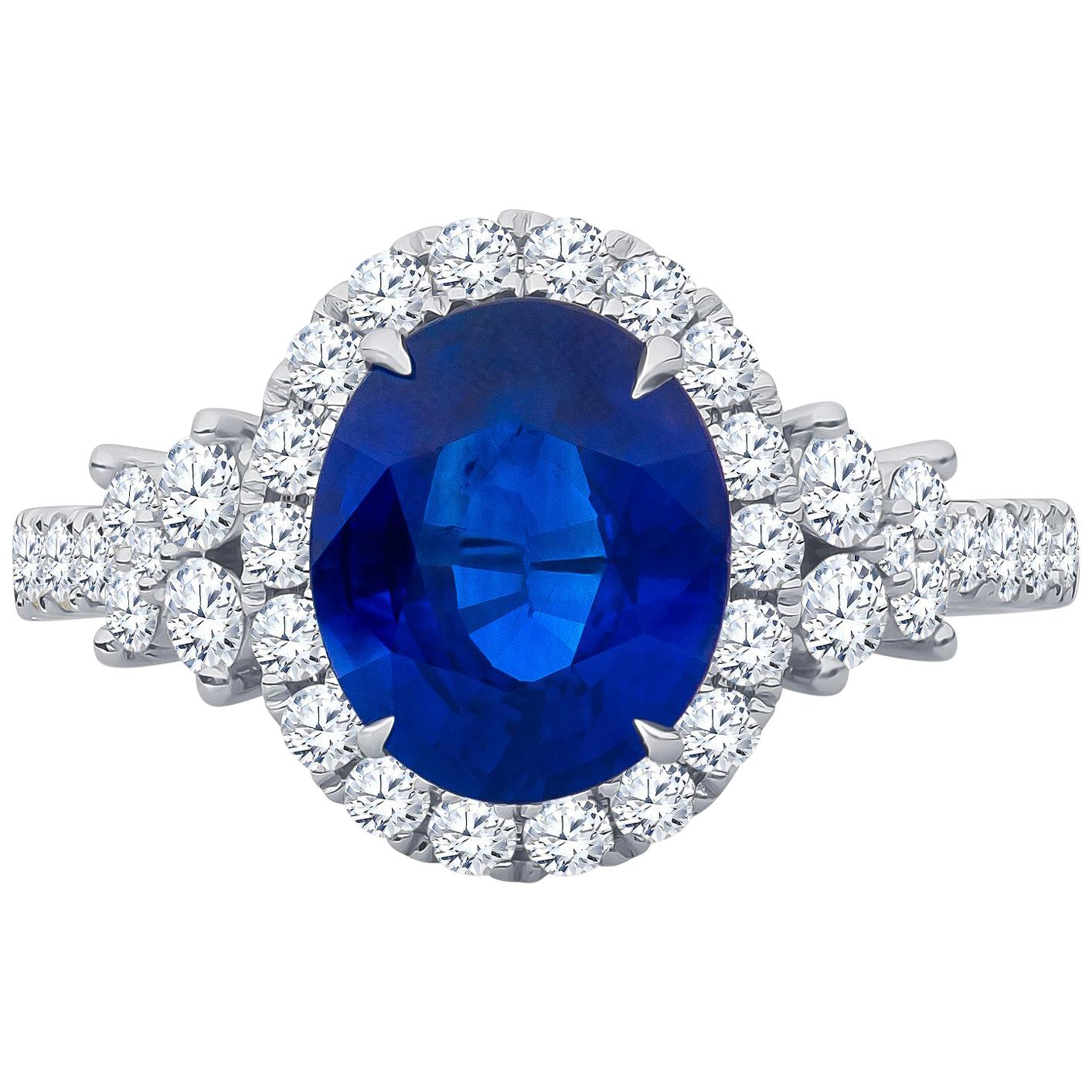 2.70 Carat (AGL)Natural Blue Sapphire, 0.84 total weight Diamonds in 18kw Ring