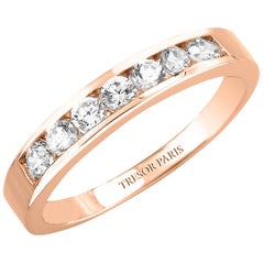 Anillo de media alianza de oro rosa de 18 KT con diamante redondo de 0,50 quilates engastado en canal