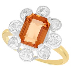 Anillo antiguo de oro amarillo con topacio de 2,38 ct y diamante de 1,88 ct