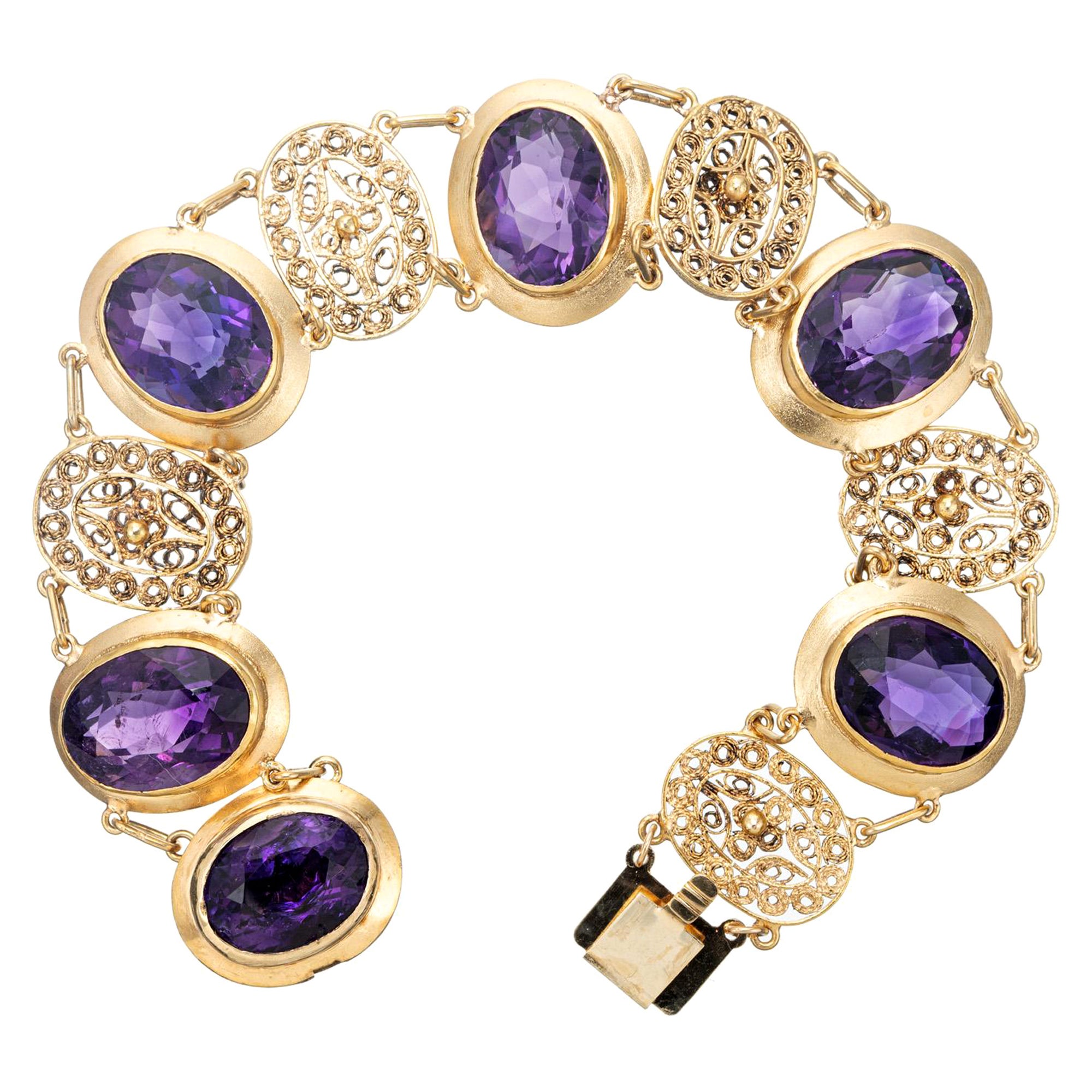 27.00 Carats Oval Amethyst Yellow Gold Filigree Filigree Link Bracelet For Sale