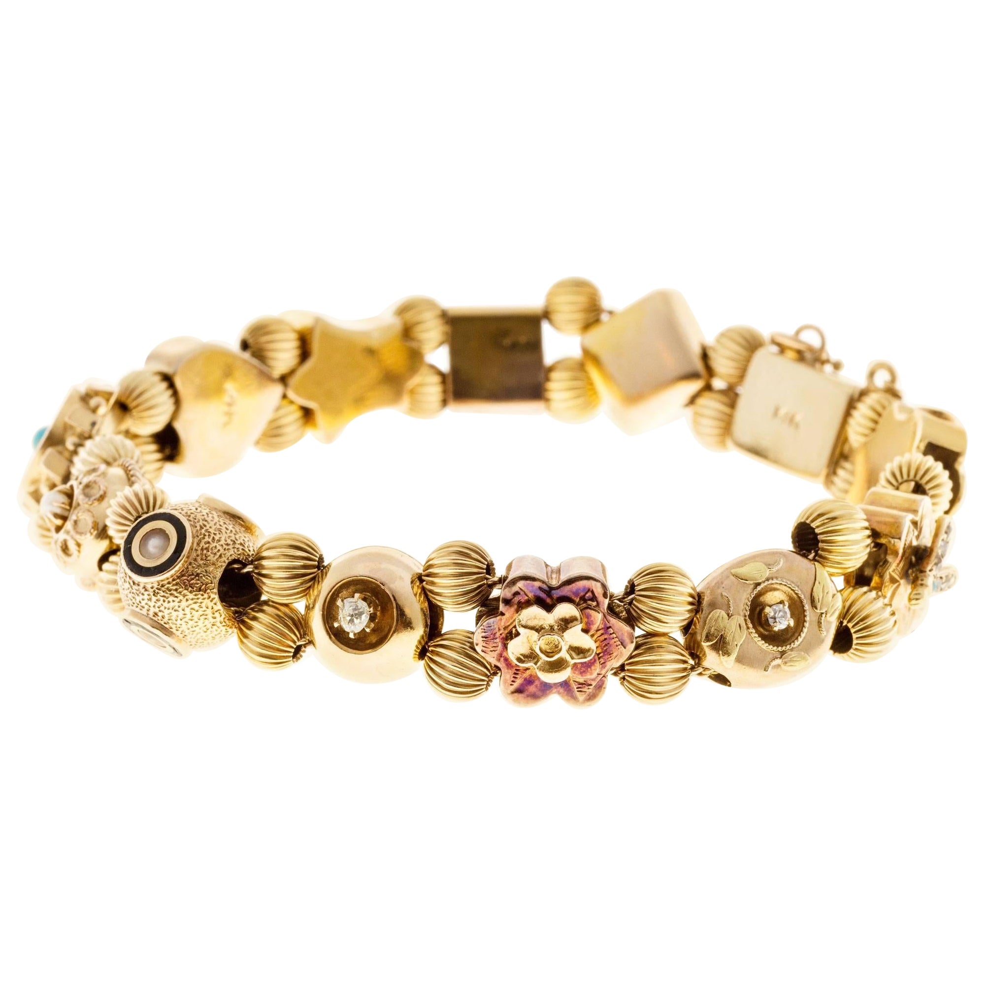 Bracelet coulissant en or avec saphir, perle, turquoise et diamants en vente