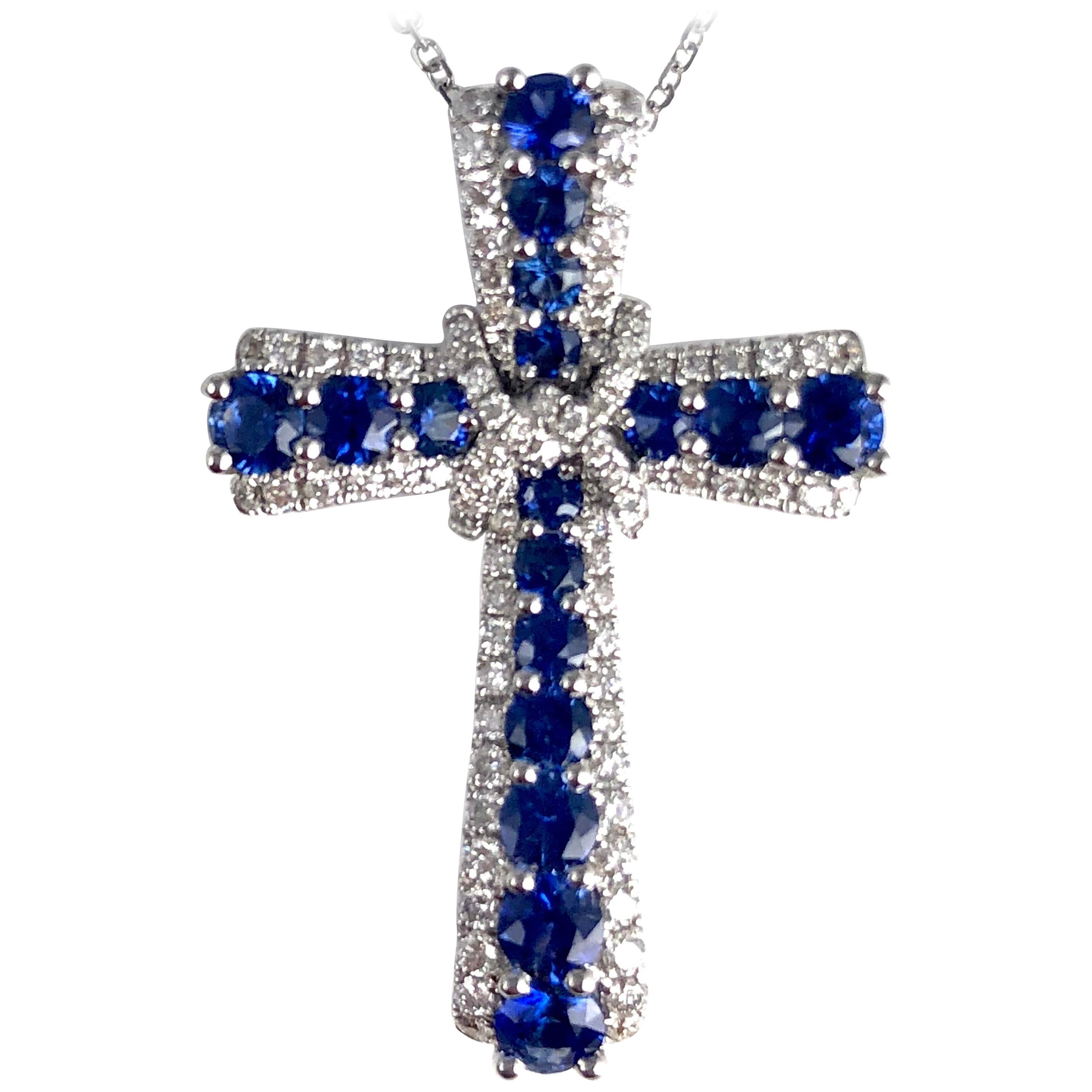 1.24 Carat Vivid Blue Sapphire and Diamond Embellished Cross Pendant