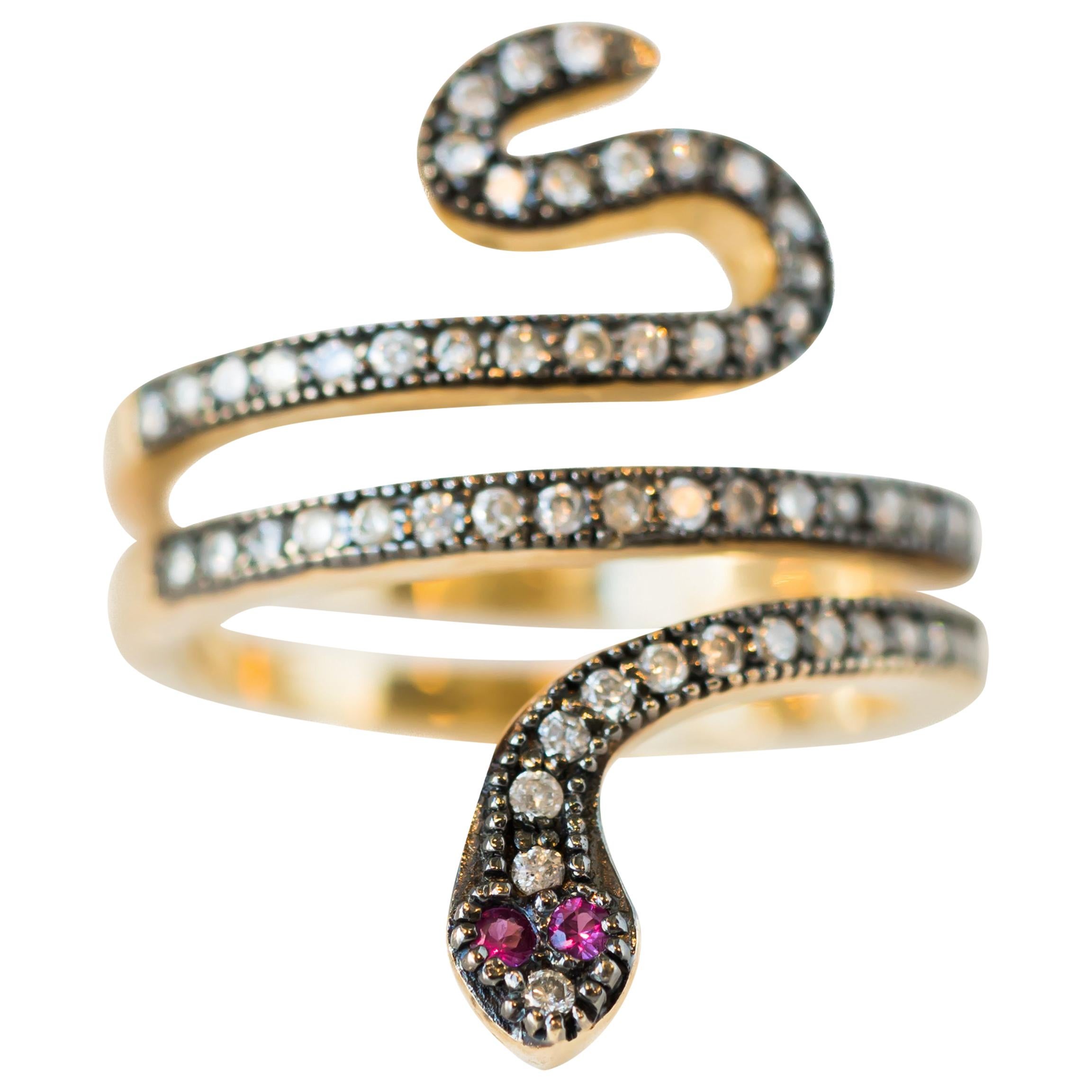 0.39 Carat Diamond and Ruby 14 Karat Gold Serpent Ring For Sale