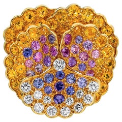 Broche Pensamiento Jean Vitau de oro amarillo de 18 quilates, diamantes y zafiros de color