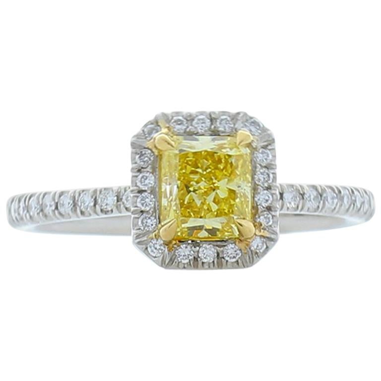 GIA Certified 0.72 Carat Radiant Cut Fancy Intense Yellow Diamond Cocktail Ring