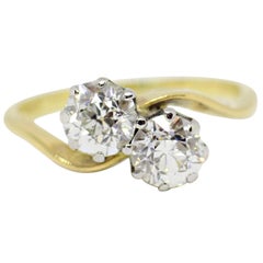 1.10 Carat Two-Stone Cross-Over Diamond Twist Engagement Ring, circa 1920s