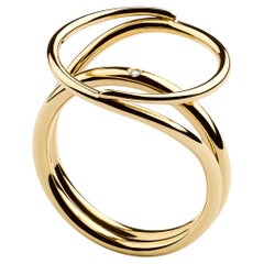 Misui Large Fluent Ring in 18 Karat Gold with a White Diamond