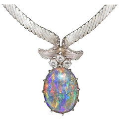 Magnifique collier en or blanc 18 carats avec opale d'Australie et diamants