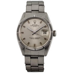 Rolex Men's Oyster Perpetual Date 1501 Stainless Steel Engine-Turned Bezel Watch