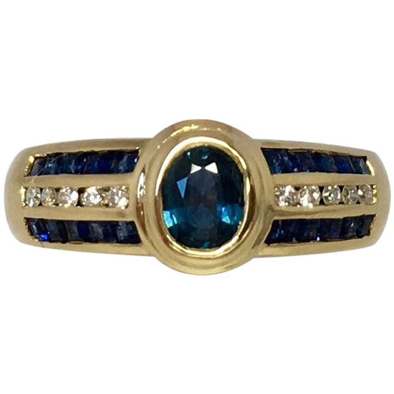 18 Karat Blauer Saphir & Diamant Designer Ring 1 Karat Gelbgold Rubover Lünette Set