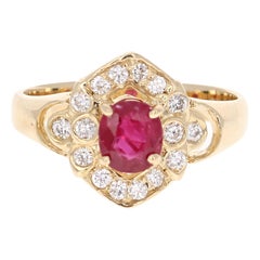 1.20 Carat Oval Cut Burmese Ruby Diamond 14 Karat Yellow Gold Cluster Ring