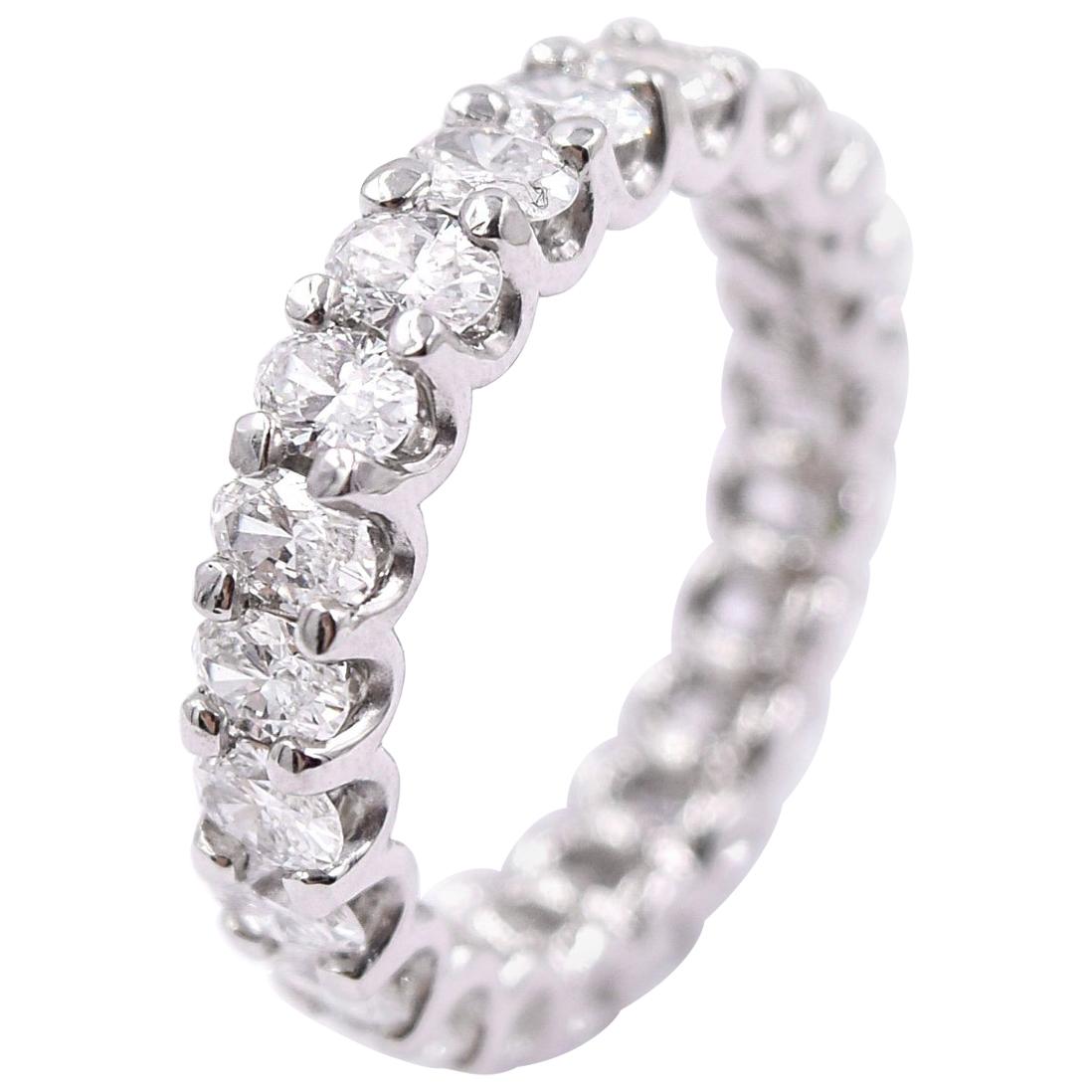 2.62 Carat Oval Diamond Wedding Band in Platinum For Sale