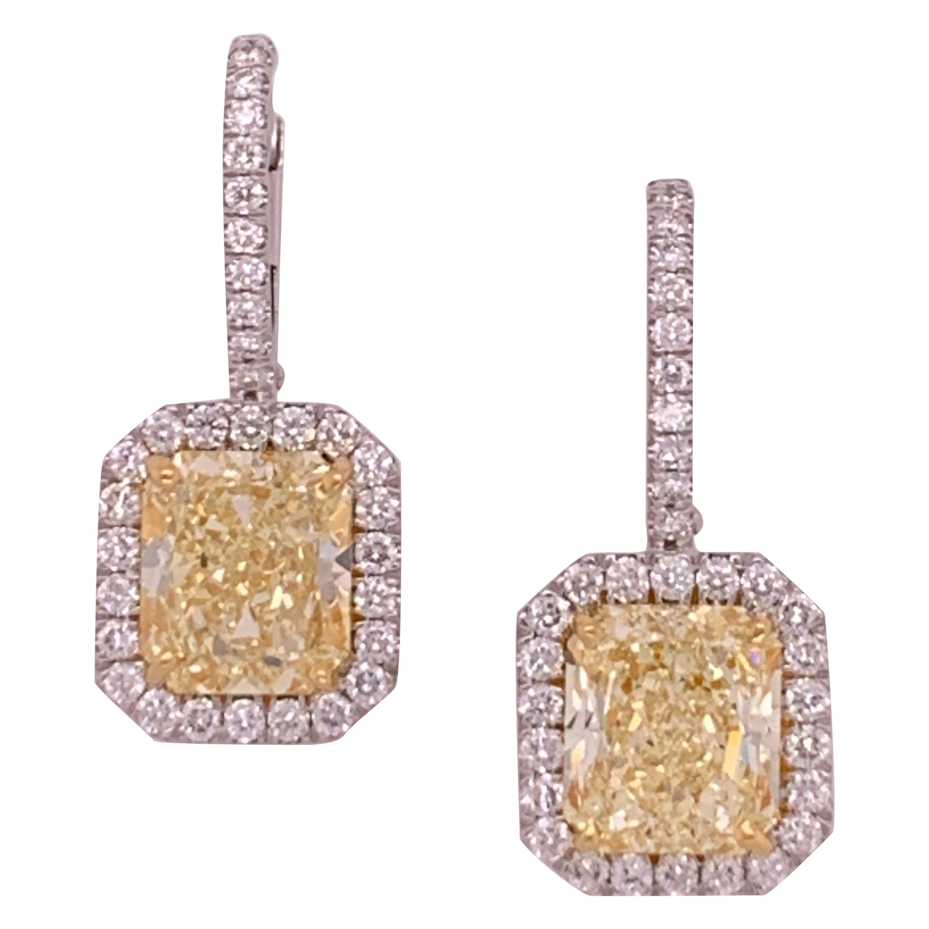 GIA 5.70 Carat Platinum and Gold Radiant Fancy Light Yellow Diamond Earrings VVS