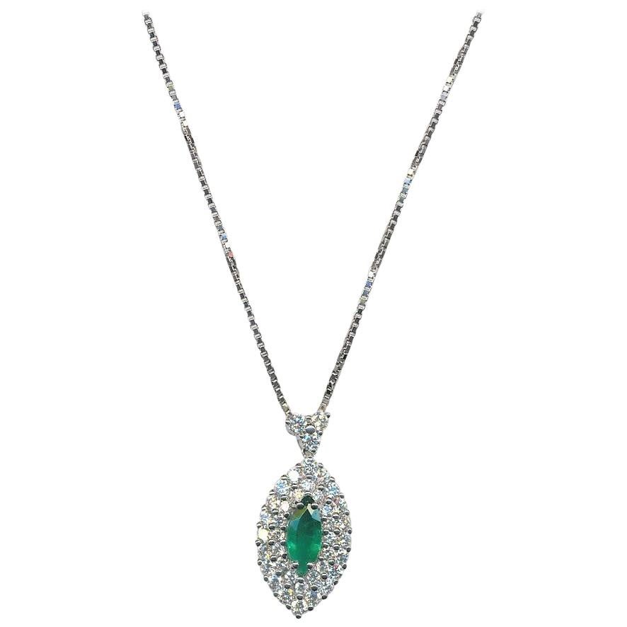 0.61 Carat Emerald 1.11 Carat Diamonds White Gold Necklace For Sale