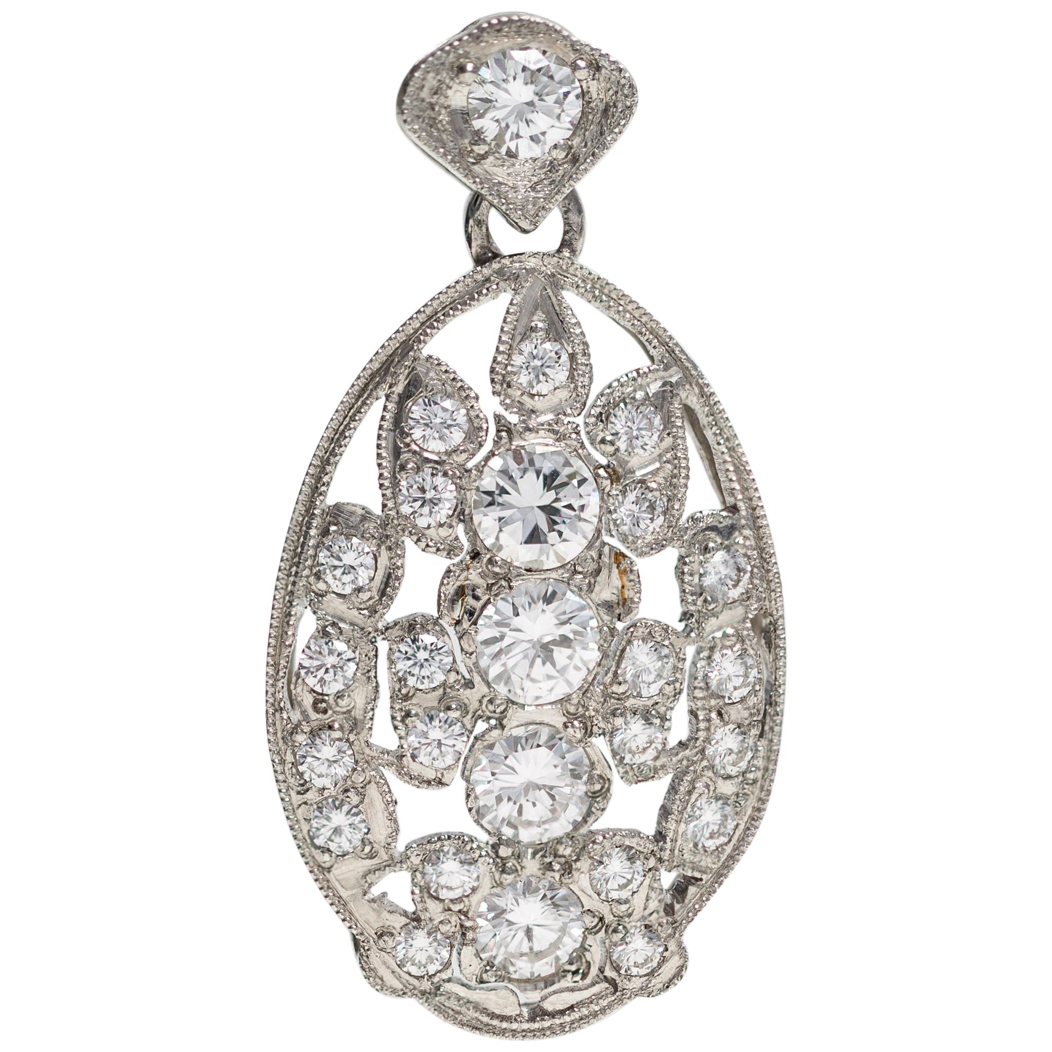 Platinum Oval Shaped Pendant with Diamonds For Sale
