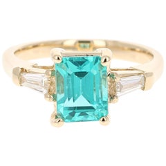 2.70 Carat Emerald Cut Apatite Diamond 14 Karat Yellow Gold Three-Stone Ring