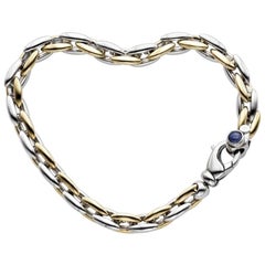 14 Karat Two-Toned Gold and Sapphire Oval Bracelet
