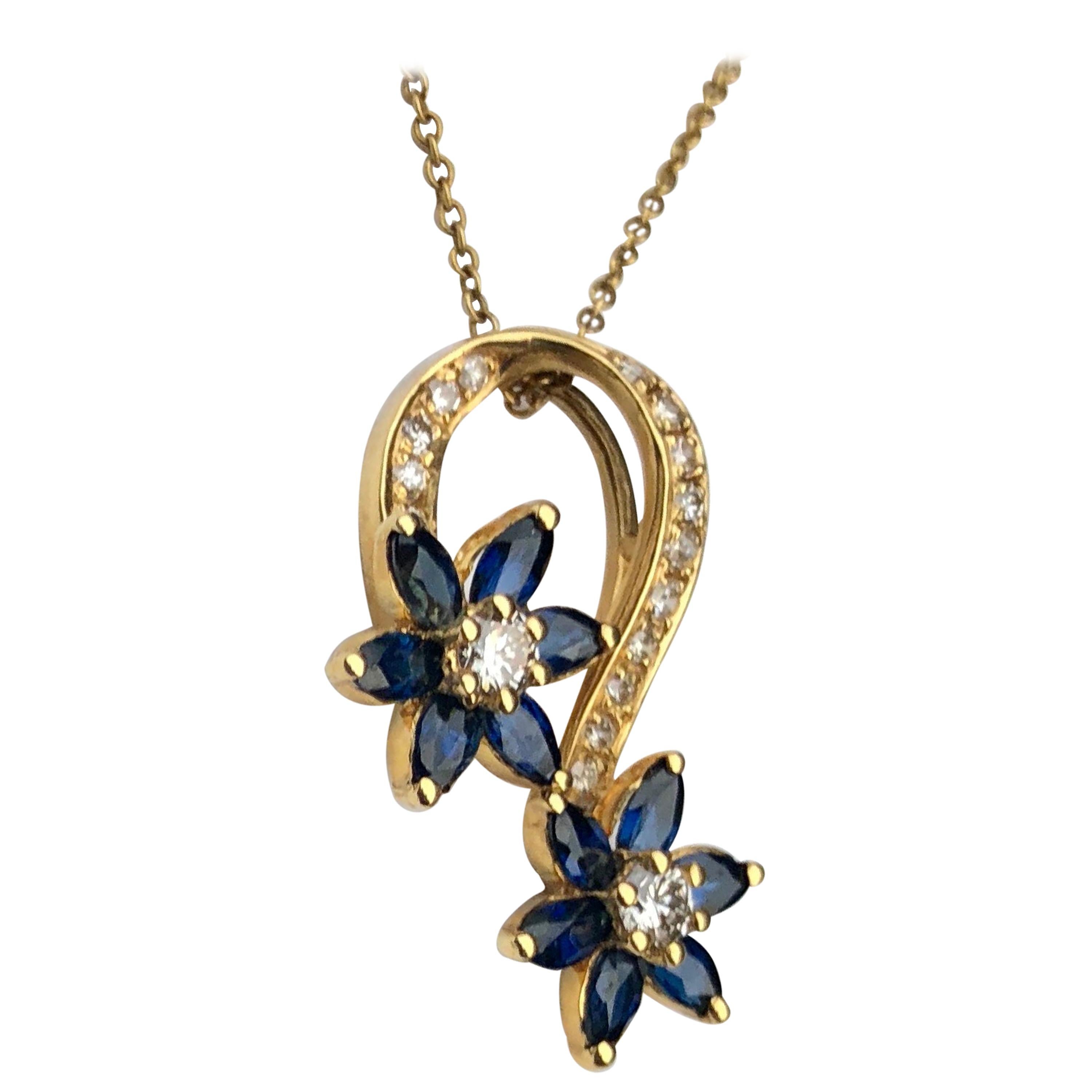 Playful Spinning Flowers Sapphire Diamond 18 Karat Yellow Gold Pendant on Chain For Sale