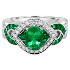 1.45 Total Carats Emerald & 0.30 Carat Diamond 14 Karat White Gold Cocktail Ring