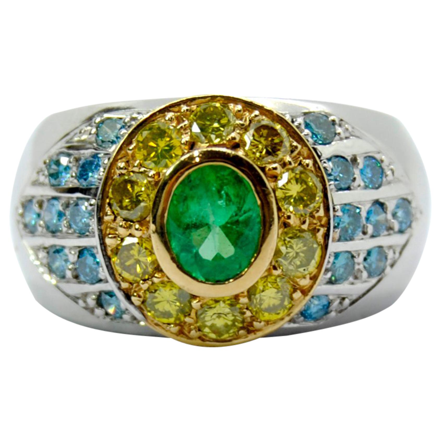 Blue and Yellow Diamonds Pairing with a Tsavorite in an 18 Karat White Gold Ring