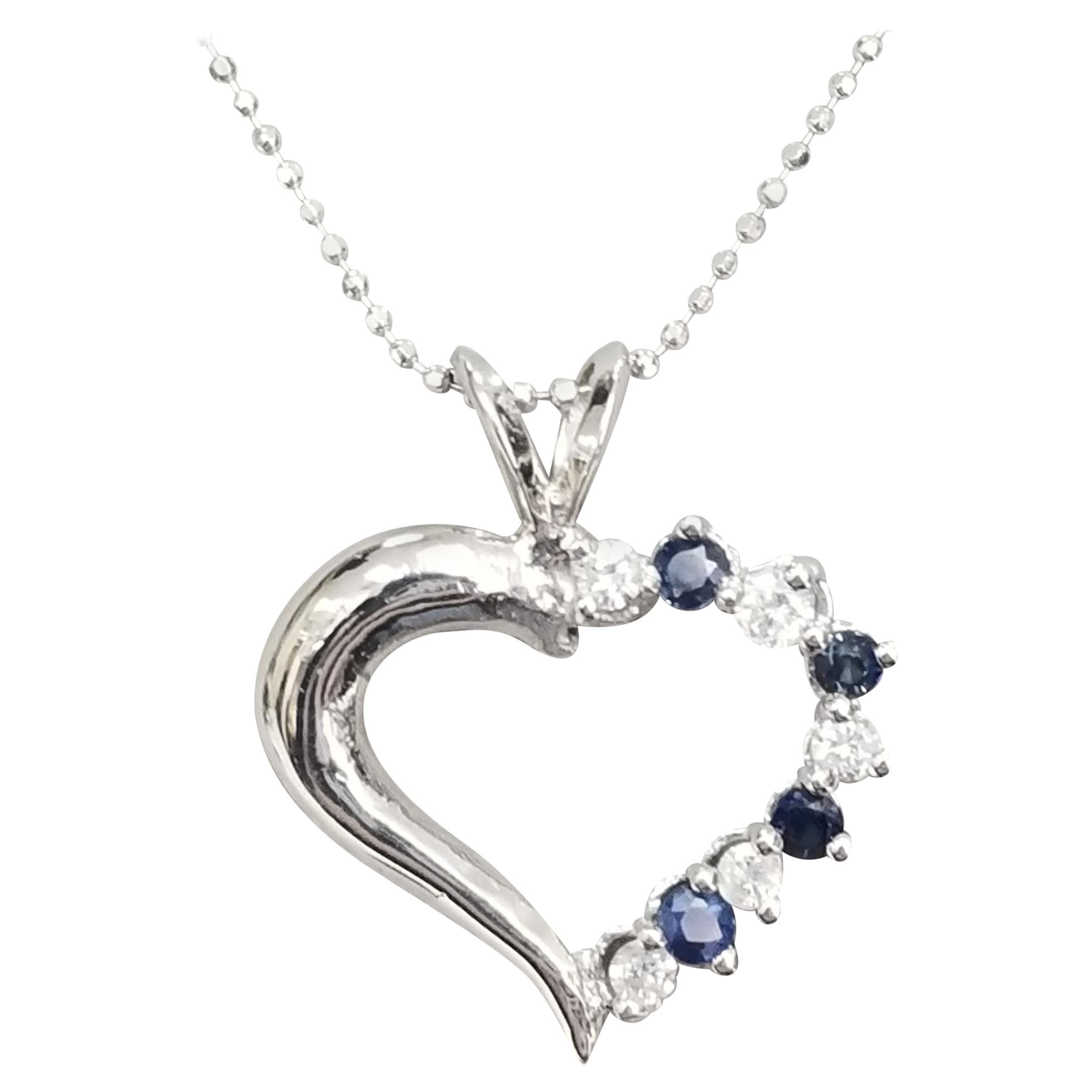 14 Karat Diamond and Sapphire Heart For Sale