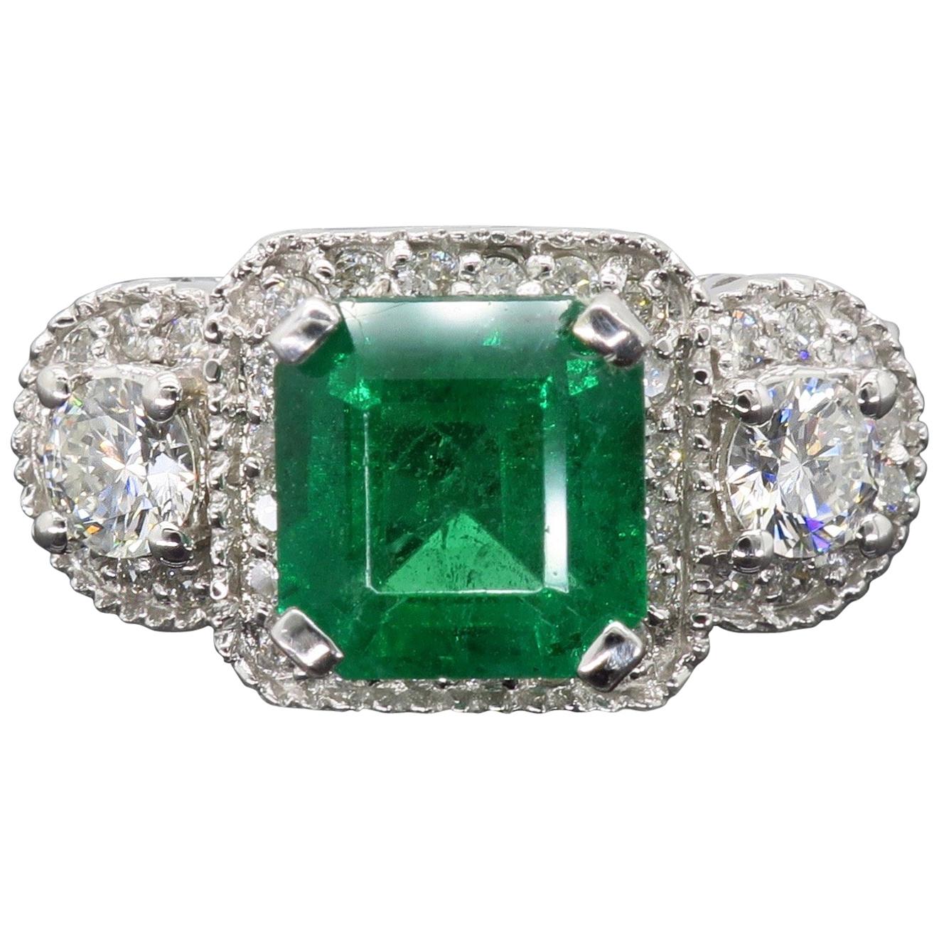 Diamond and Emerald Three-Stone Ring
