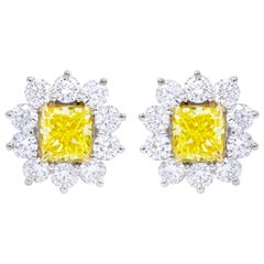 GIA Certified 3.06 Carat Fancy Yellow Diamond Stud Earrings