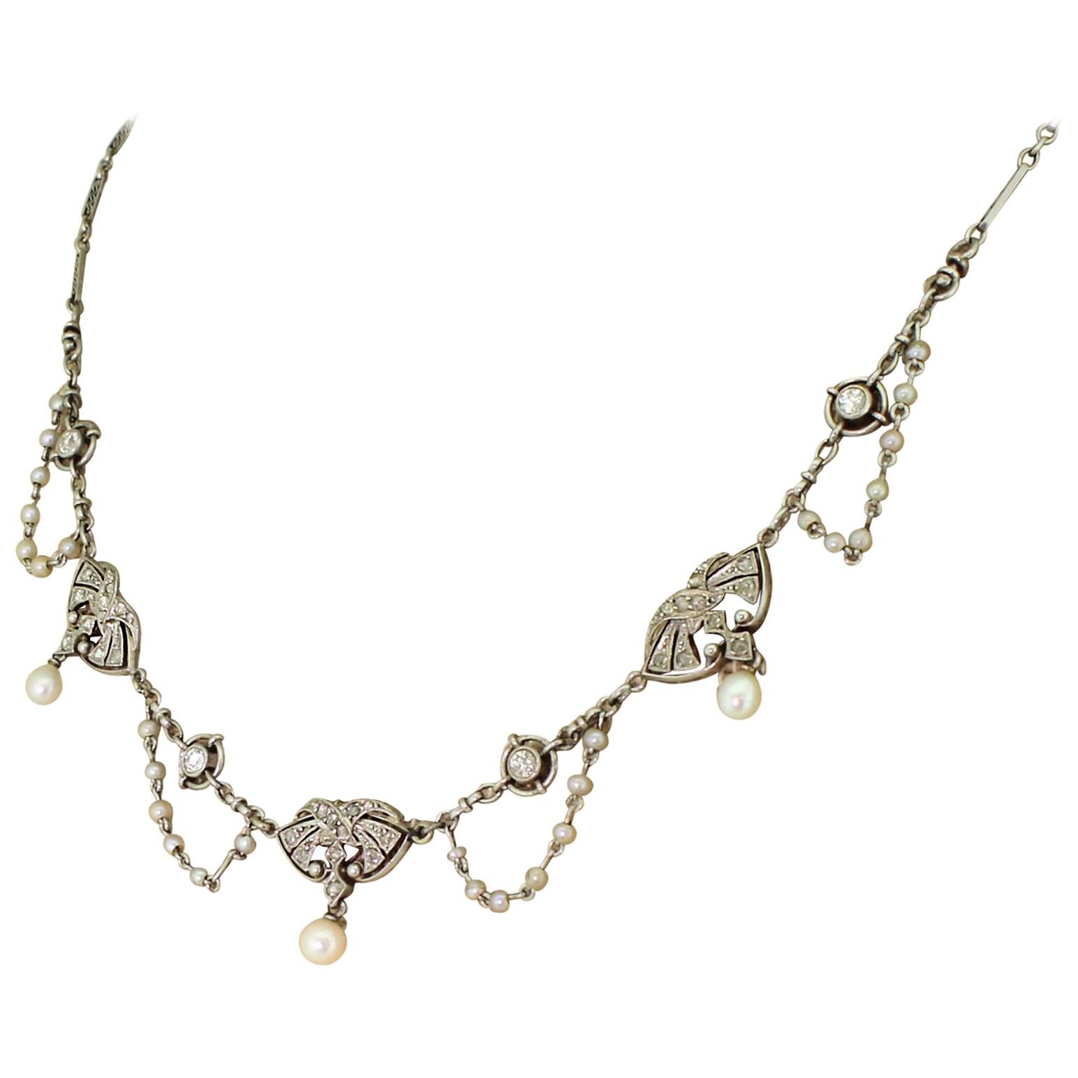 Early 20th Century Natural Pearl and Diamond Platinum Necklace For Sale