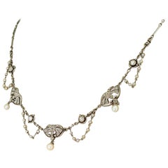 Early 20th Century Natural Pearl and Diamond Platinum Necklace