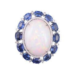 Set in 18K Gold, Ethiopian Opal, Ceylon Blue Sapphire and Diamonds Cocktail Ring