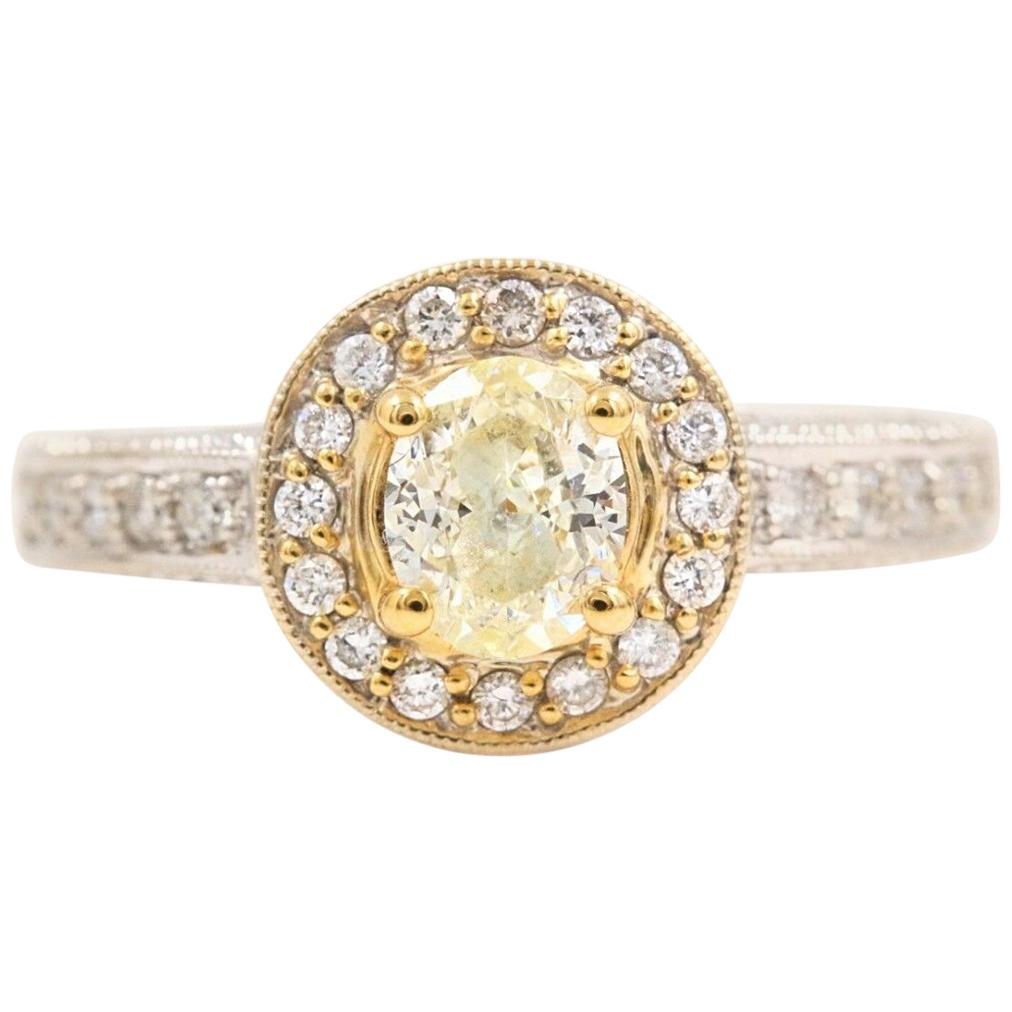 Yellow Oval Diamond Engagement Ring 0.93 Carat in 18 Karat White Gold For Sale