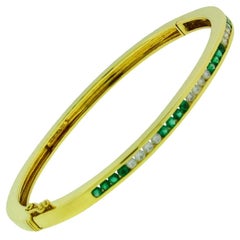 Tiffany & Co. Diamond and Emerald Bangle Bracelet in 18 Karat Gold Size Small