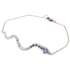Bracciale con zaffiro rosa smeraldo e ciondolo a forma di serpente in argento J Dauphin