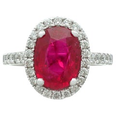 Vintage 3.75 Carat Ruby and Diamond White Gold Cluster Ring Circa 1990