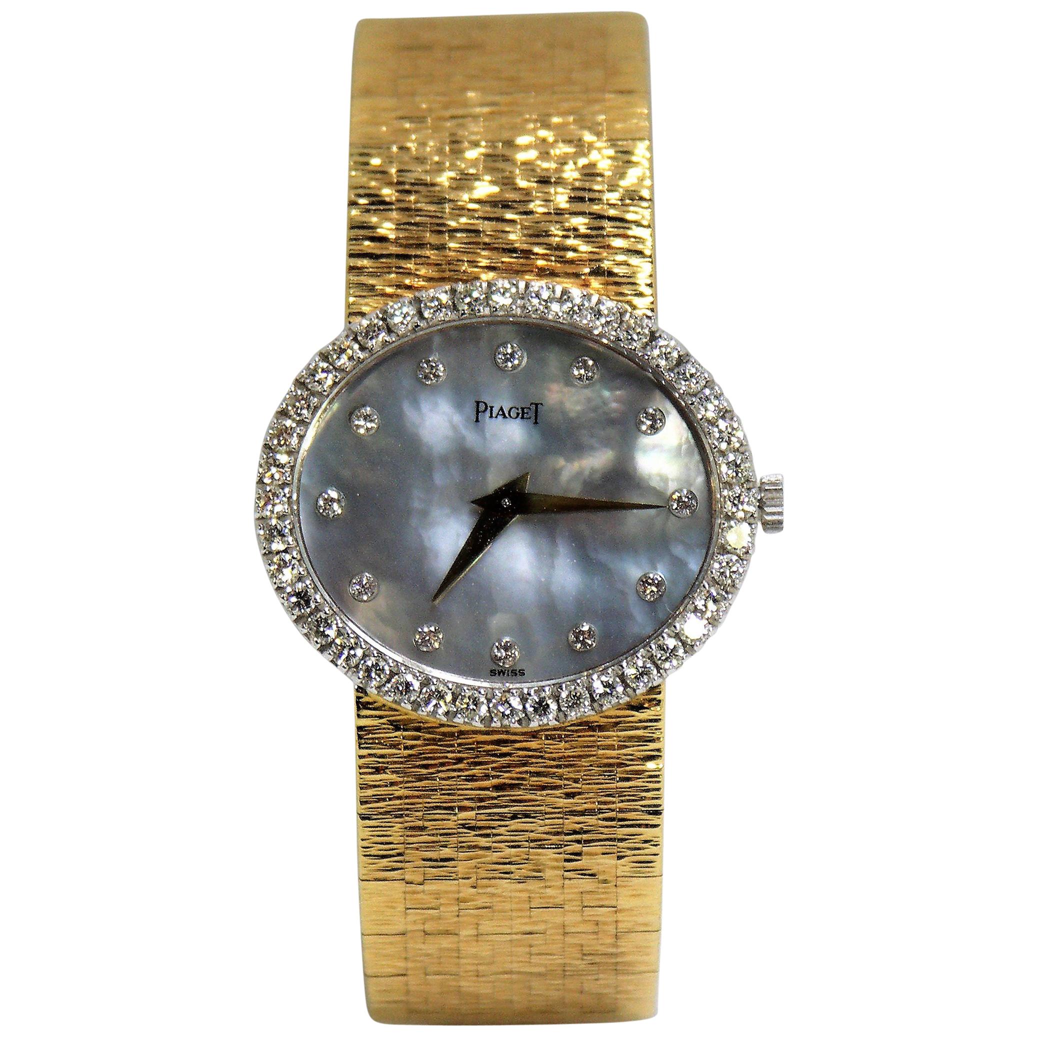 Piaget Ladies Gold Watch with Blue Gray Mother of Pearl Diamond Dial and Bezel